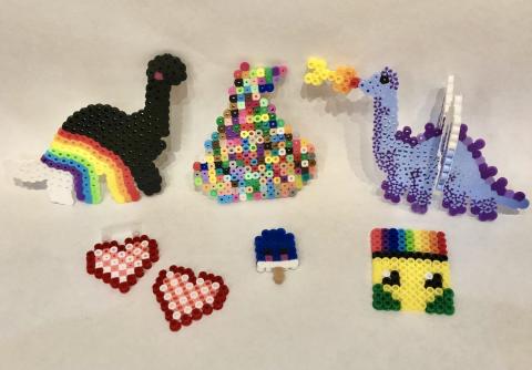 A variety of perler bead creations.