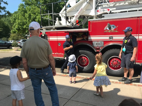 Firefighter storytime lots of kids PNG