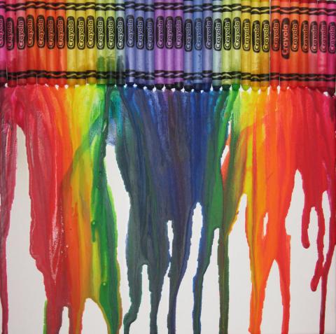 crayons melt onto a sheet of white paper