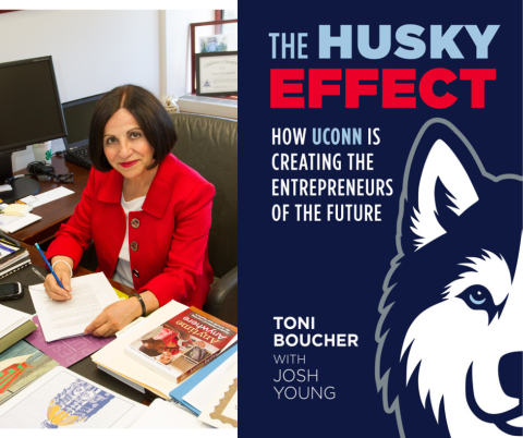 Toni Boucher with book cover The Husky Effect