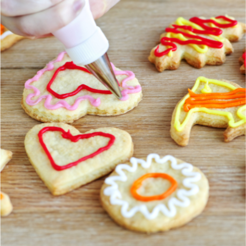 Sugar cookies decorated with frosting.