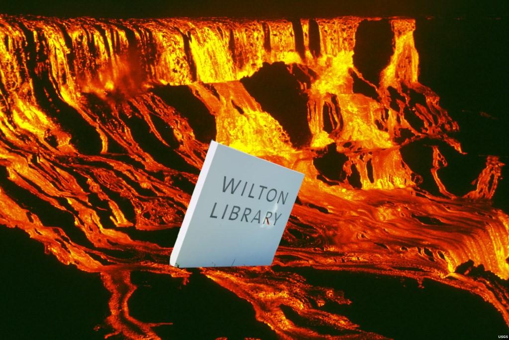 Wilton Library's exterior sign sinks into a river of molten rock.