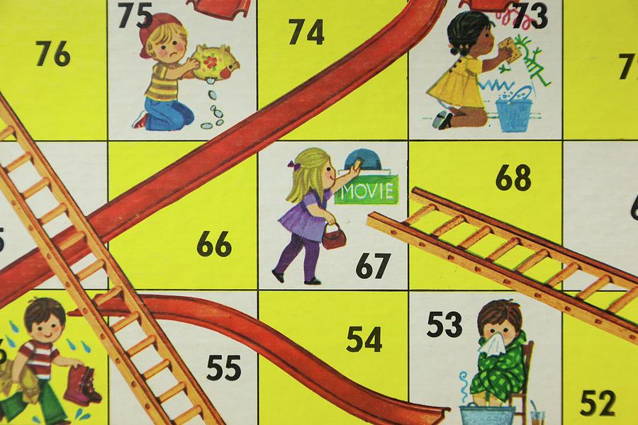 Close up view of a Chutes and Ladders board game.